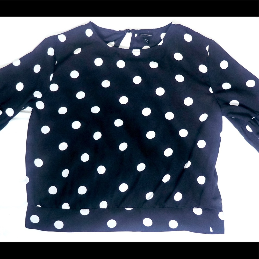 Black blouse with medium sized white dots